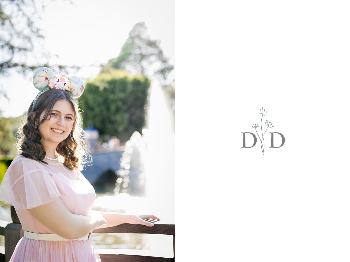 Grad Portrait in front of Disneyland Castle