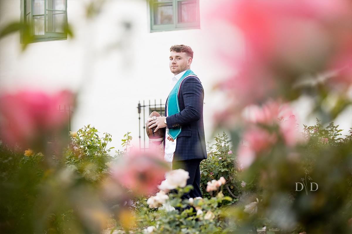 Grad photo with pink flowers