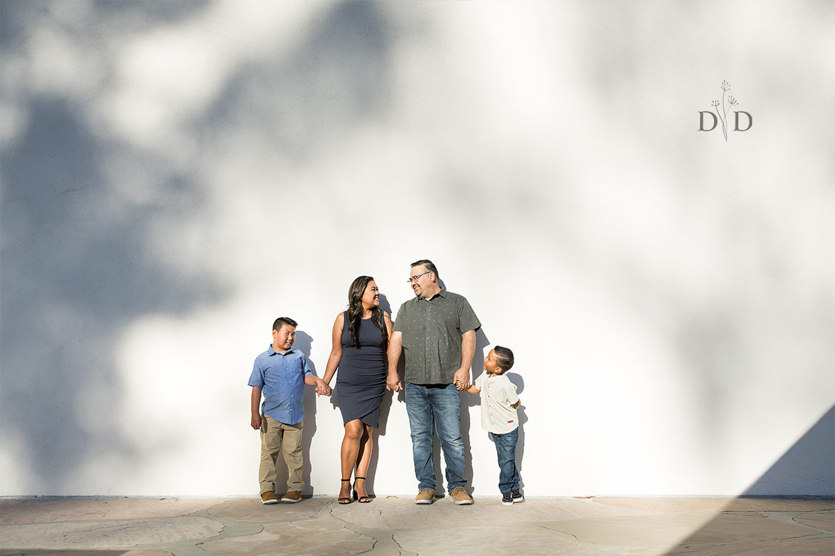 Family Photo with Shadows on a White Wall
